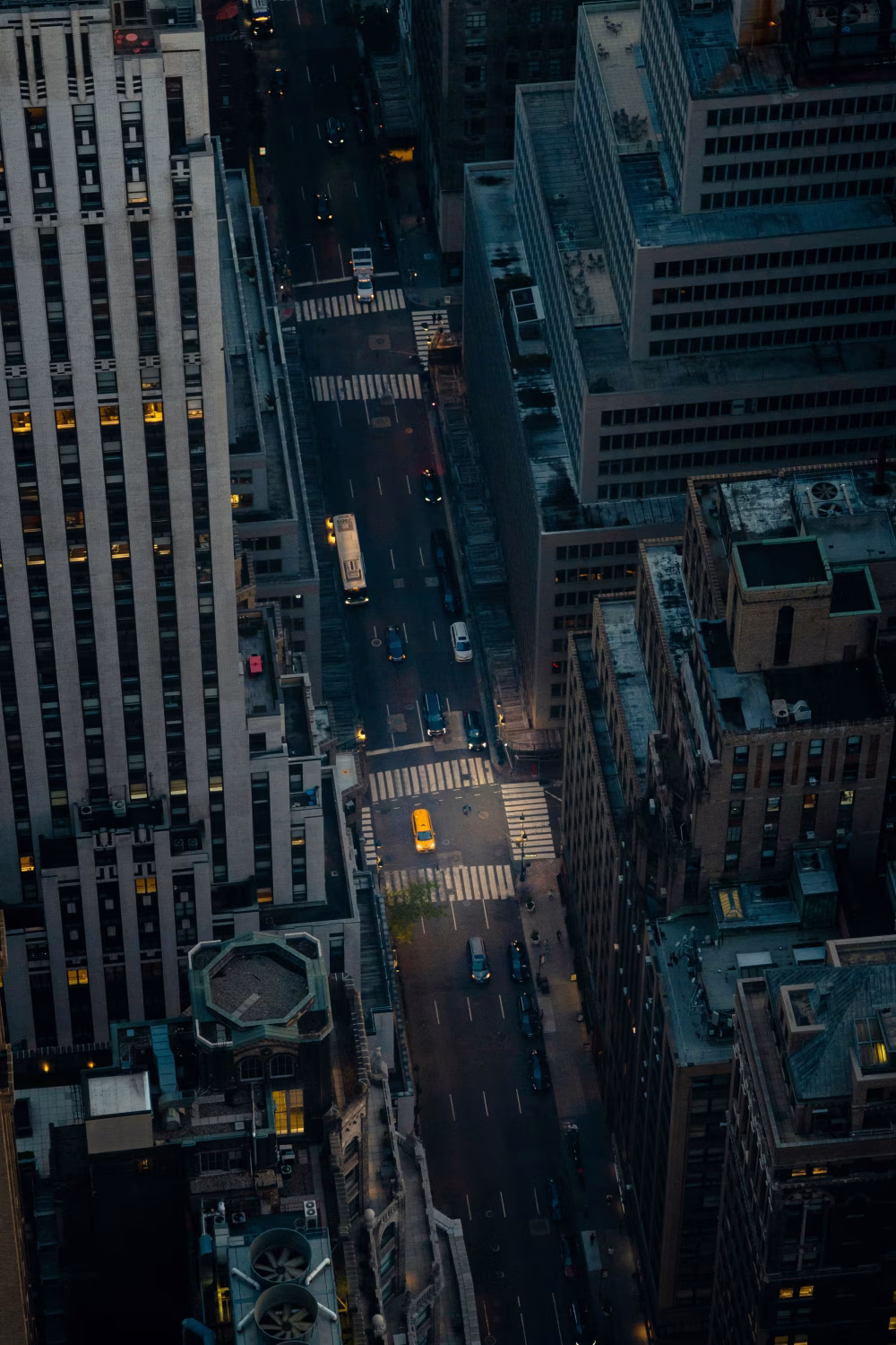 Aerial View of City Crossroads With Traffic and Highrise Buildings