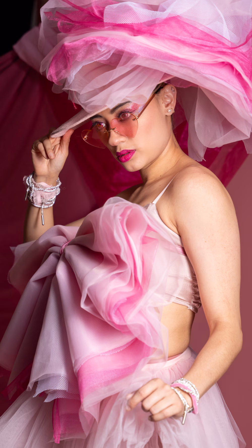 Elegant Woman in Vibrant Pink Fashion and Stylish Accessories