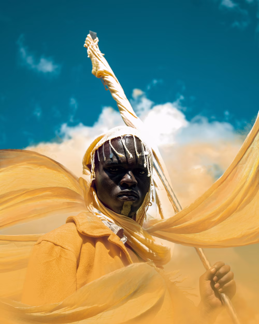 Portrait of a Warrior in Golden Attire Under a Vibrant Sky