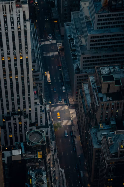 Aerial View of City Crossroads With Traffic and Highrise Buildings