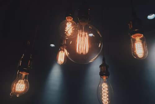 Illuminated Vintage Light Bulbs in a Dark Ambient Setting
