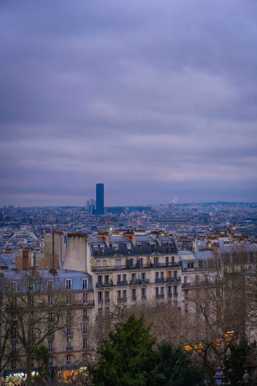 Scenic Cityscape of Paris with Dusk Lighting and Iconic Landmarks Viewed Horizontally