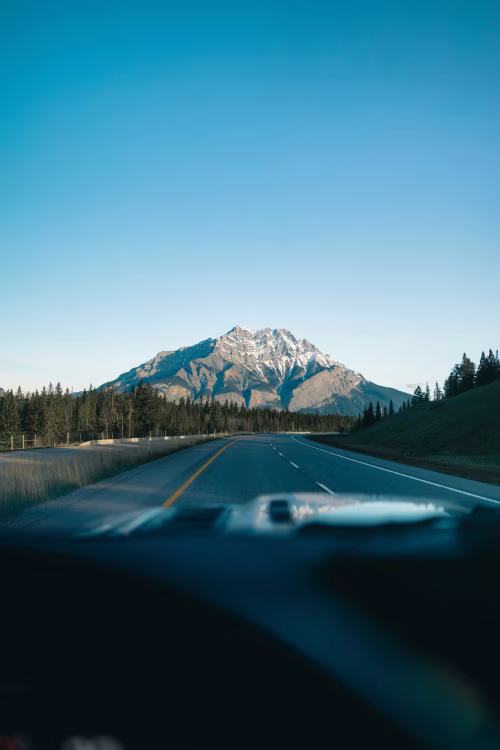 Scenic Highway View of Mountains and Forest on a Clear Day