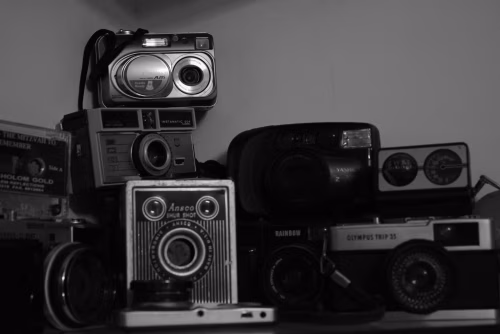 Vintage Camera Collection in Black-and-White Artistic Display